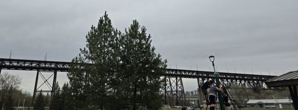 A view of Grizzly Bear Lodge Park and the High Level Bridge in Edmonton on a busy day.
