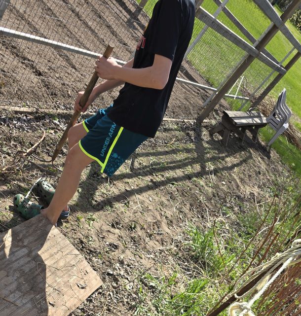 A wild teenager appears, getting some honest labour done