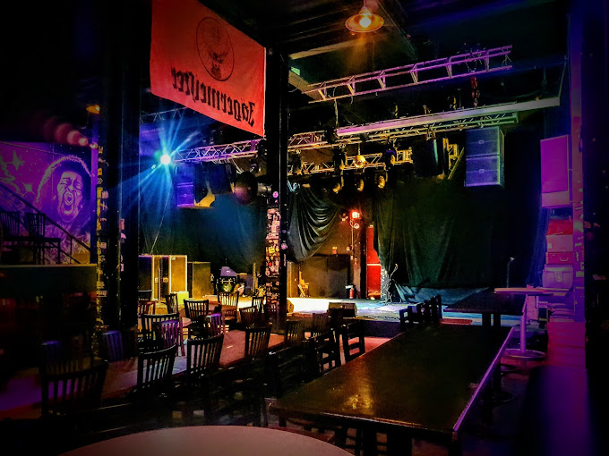 An interior view of The Vat pub, complete with performing stage.